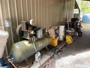 Tractor stays and the 2 2500 gal catchment tanks