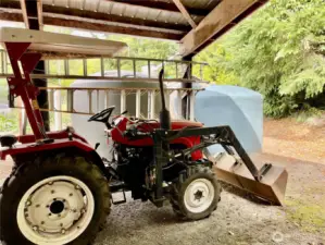 Tractor stays and the 2 2500 gal catchment tanks