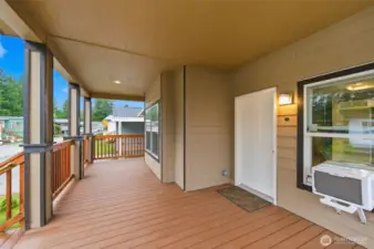 Recessed lighting and a spacious layout create the perfect spot to relax, read, or visit with neighbors.