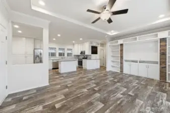 Open-concept floorplan connects living, dining, and kitchen spaces—ideal for entertaining and everyday comfort.