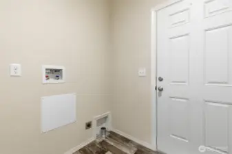 Utility room with extra storage keeps everyday chores simple and organized.