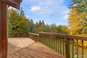 Beautiful new 1000+ foot deck with sliding door from kitchen & living room & primary suite