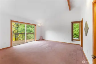 Primary Suite on main with access to the deck