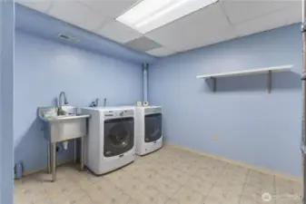 HUGE lower level 2nd laundry / storage room