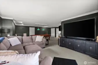 Around the corner there is plenty of space for entertaining, mini theater or area to watch all the sports games.