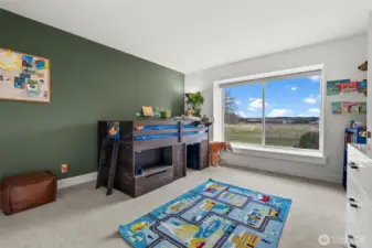 Bedroom 2 upstairs on the other side of the shared full bath.