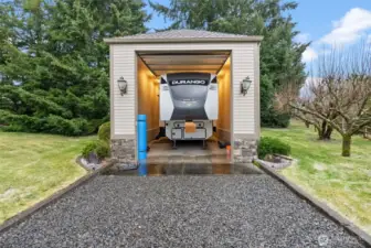 The heated RV garage, currently storing a large 5th wheel.