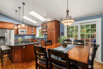 Dining room with sliders to Trex deck with gas line for your grill!