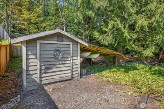 Large shed with power and covered storage for kayaks or your other outdoor toys!