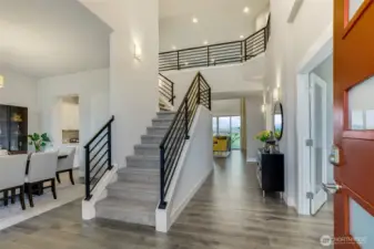 Enter to vaulted ceilings and natural light