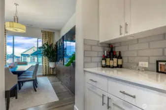 Bulter's pantry joins the formal dining room to the kitchen