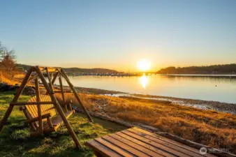 Sunsets year round, enjoyed from your low bank waterfront