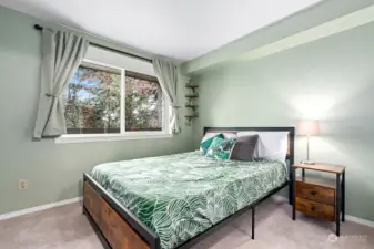Nicely proportioned Bedroom with Walk-in Closet and Treed outlook.