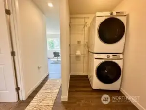 Laundry cove and shelving central in home