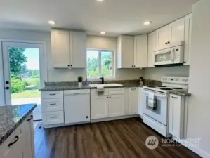 Bright kitchen with Granite countertops