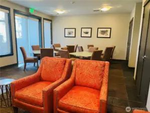 Community Room seating area with access to outdoor table and chairs.