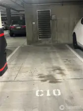 C10 parking space is close to electrical for HOA approved EV charger, owner installed