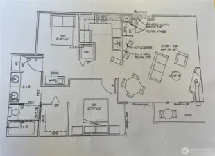 Original Floor Plan. Owners removed half wall by front door & living area. Two columns at end of breakfast bar were not built to create an open space and view towards balcony.