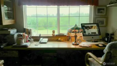 Office/desk space just adjacent to the kitchen with inspiring view!