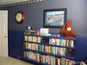 Bedroom with built-in bookshelves!