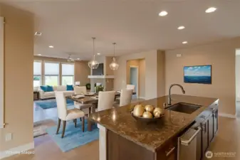 Great room concept.  This floorplan offers open concept living with gourmet kitchen and light and bright living space that takes advantage of the sweeping golf course views.