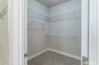 Large walk-in primary closet.
