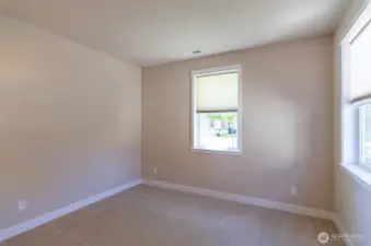 View of second bedroom, which is located near the front of the house.