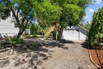 Driveway leading to shop.