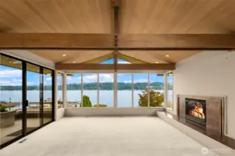 Main level living spaces have commending views of all the water activities at the comfort of your own cozy living room.