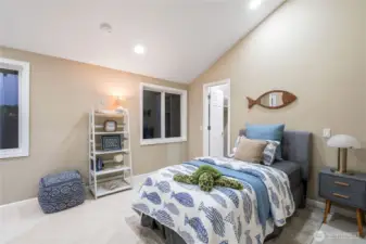 5th bedroom w/attached 1/2 bath & laundry
