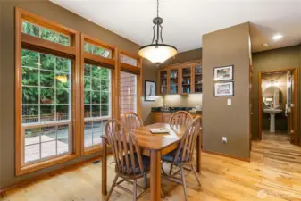 In the distance is the 3/4 bathroom and behind the built-in hutch is the main floor bedroom.