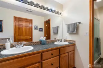 Another view of the primary bathroom looking towards the shower.