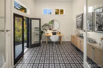 Den with french doors to patio.