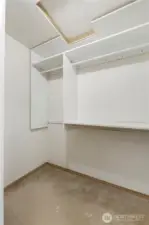 Primary walk-in closet.