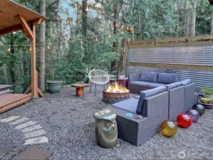Firepit seating and hot tub.