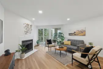 Living area with fireplace and deck access