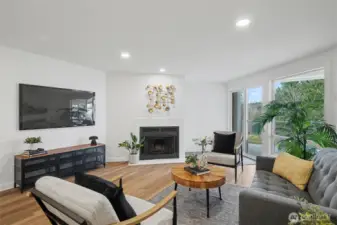 Living area with fireplace and deck access