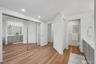 Primary bedroom with large closet and ensuite double vanity bath