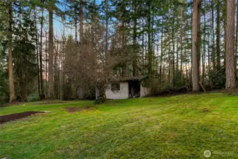 A spacious outbuilding provides ideal storage for garden tools and equipment, and with a little creativity, it can be transformed into a charming playhouse or hobby space—adding both function and fun to your property.