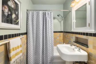 Elegant bathroom with beautifully preserved period charm.