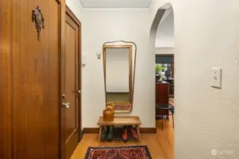 Enter into the unit with 1920's period charm