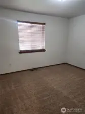 Primary bedroom w/ Walk in closet & Bathroom