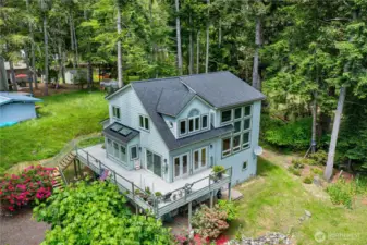 Welcome home to this stunning 3 bed/3 bathroom home spanning three thoughtfully designed levels, offering water views from multiple vantage points.