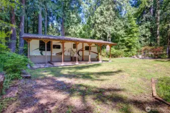 On the 2nd lot you'll find the Laredo RV for additional guest as well as a firepit and garden space.
