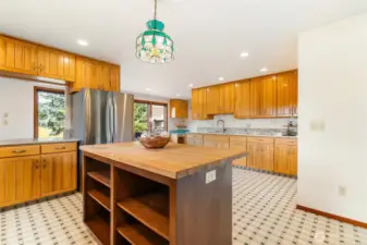 additional cabinets and extra sink on the back of the kitchen