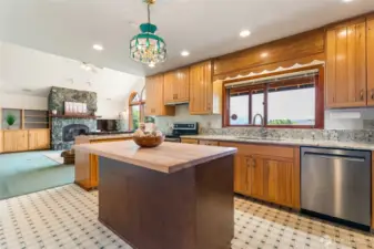 Kitchen has lots of countertop space and window looking out to the mountains