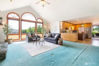 Vaulted ceiling in the living room and so much natural light coming through the windows.