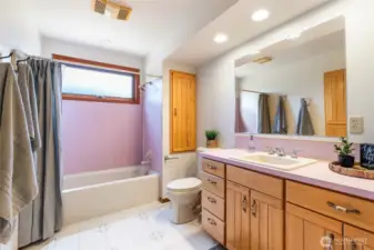 hallway full bathroom. All cabinets are hickory and lots of storage