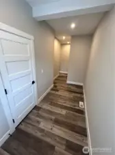 Back door entry with wide foyer - Flooring is a buyer selection. *Previous build