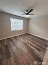 Main floor primary suite, easily accommodating a king size bed. *previous build